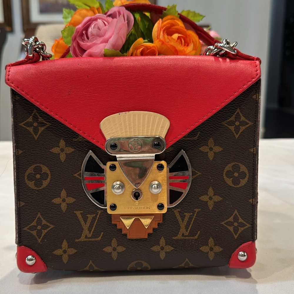 Authentic Louis Vuitton Tribal mask chained shoulder bag